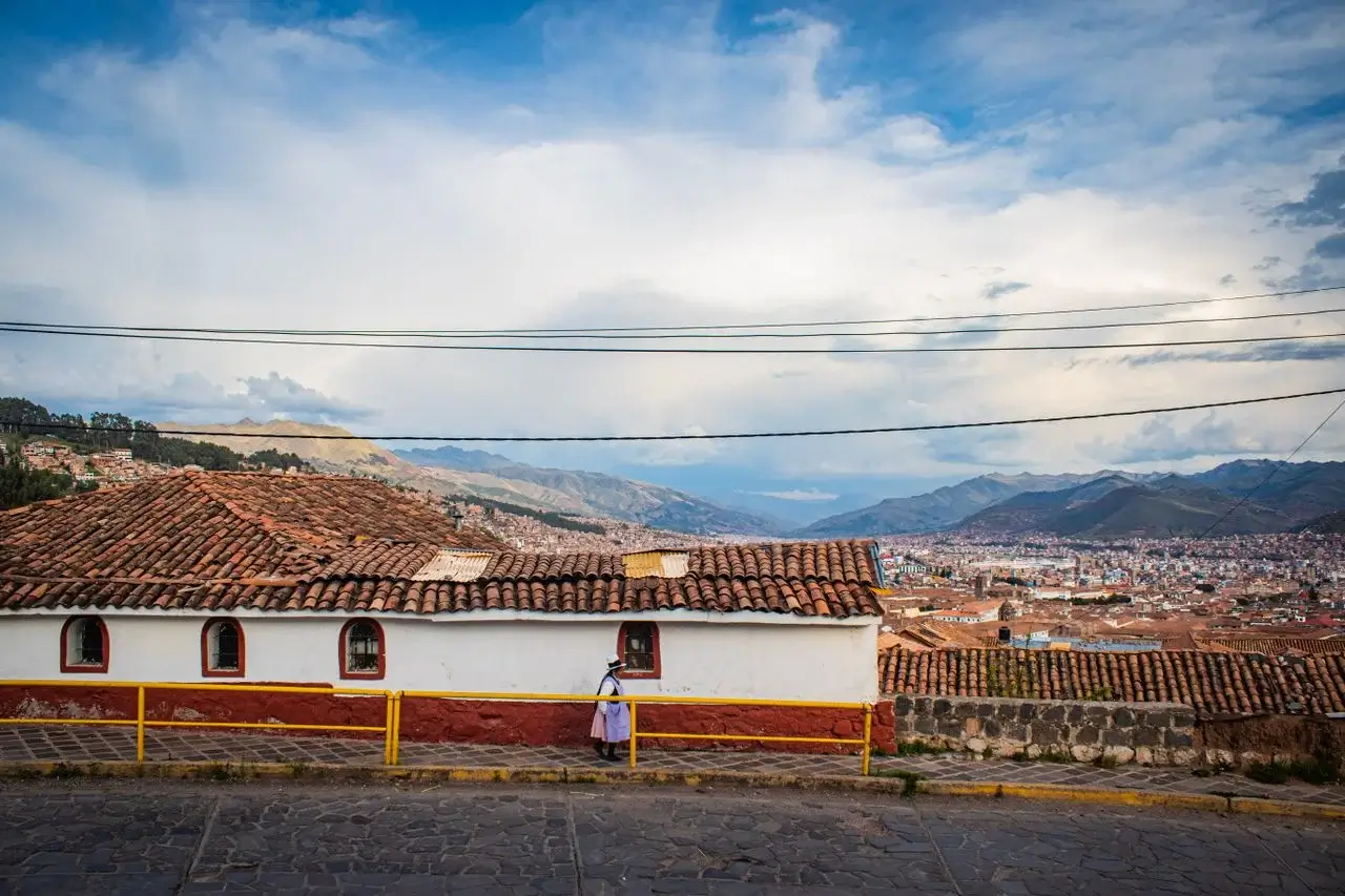 Street in Cusco, Cloudy Sky, Women walking, Andean mountains